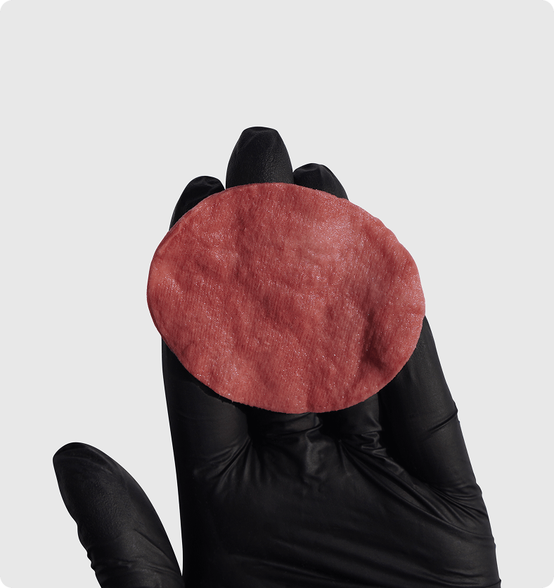 Bellini lip pigment swatch on cotton pad – pale nude shade