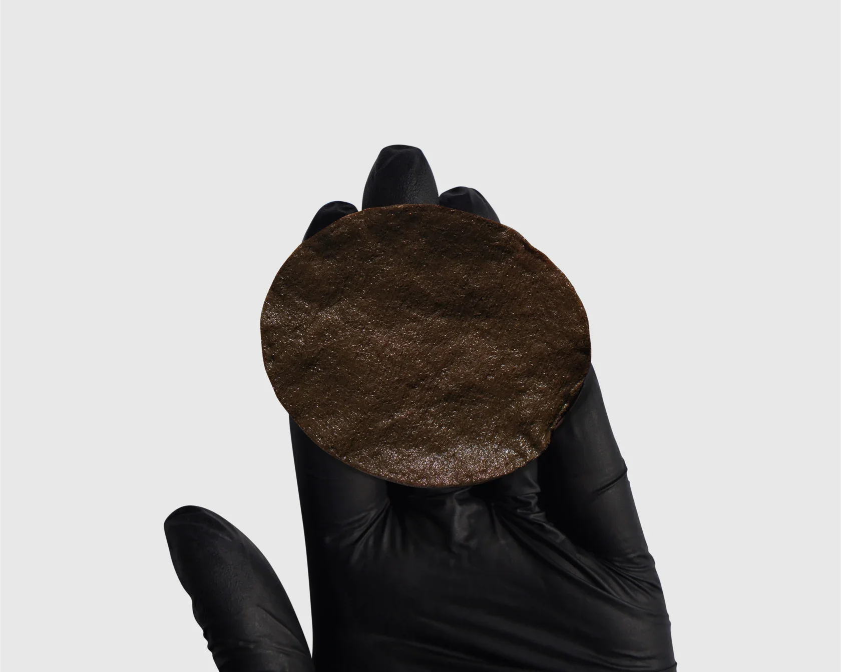 Natural Brunette swatch on cotton pad – grey-brown